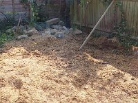 Preparing the rear patio where the cherry tree used to be.
